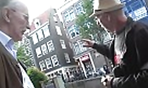 Excited dear boy takes a trip in a difficulty amsterdam redlight courtyard